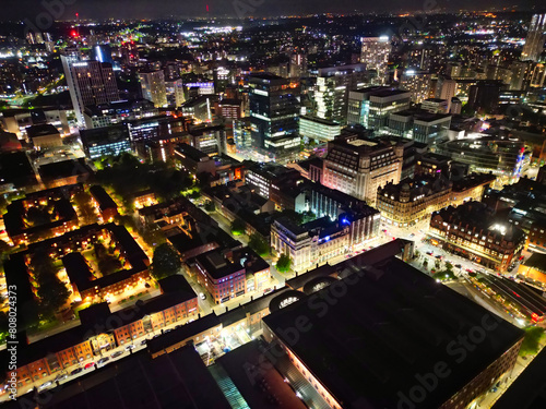 Aerial Night View of Illuminated Central Manchester City and Downtown Buildings, England United Kingdom. May 4th, 2024