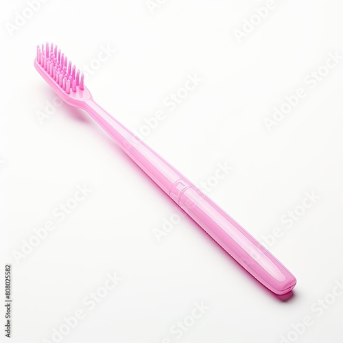 Pink toothbrush isolated on white background