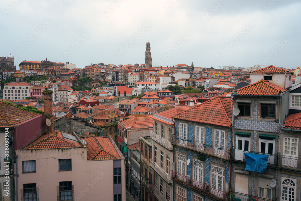 Overcast sky over the historic cityscape of Porto featuring the tower dos clerigos