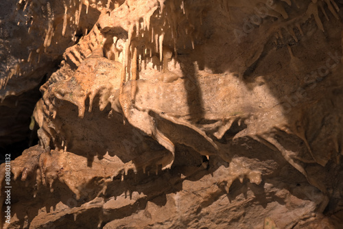 Inside limestone cave - different morphological elements created by driping or flowing water and calsium dioxide: stalagmites, stalactites, pipes, karst landscape, flowstones