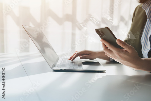 Online shopping and credit card payment concept, person is shopping on an online shopping website, purchasing goods and services securely, debiting credit card to pay for goods on the internet.