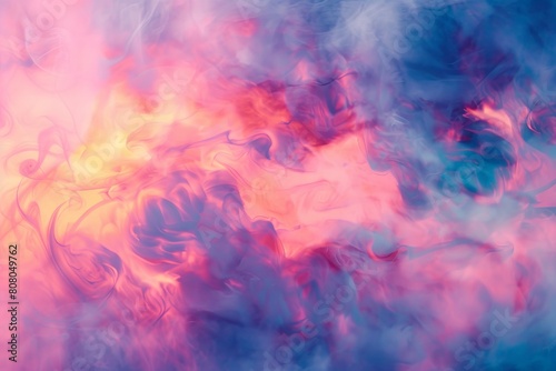 Blurred image of pink  blue  and yellow clouds background
