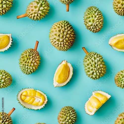durian slices and whole seamless, pattern, blue background photo