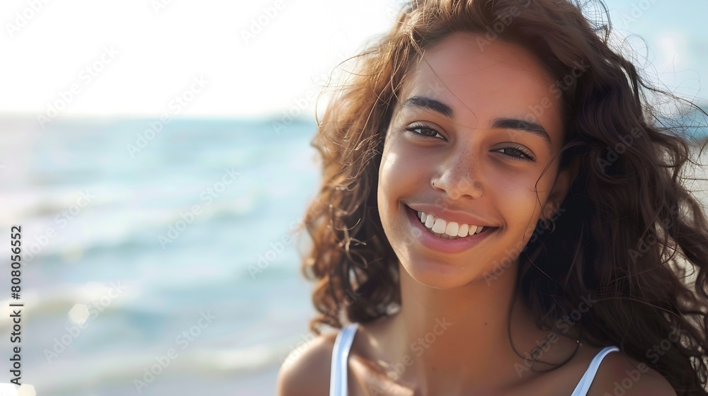 Portrait of young woman at sea looking at camera Smiling latin hispanic girl standing at the beach with copy space and looking at camera Happy mixed race girl in casual outfit with win : Generative AI Portrait of young woman at sea looking at camera Smiling latin hispanic girl standing at the beach with copy space and looking at camera Happy mixed race girl in casual outfit with win : Generative AI