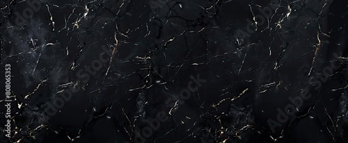 Close up of black marble texture resembling midnight with white veins