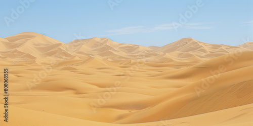 A desert landscape with a blue sky in the background