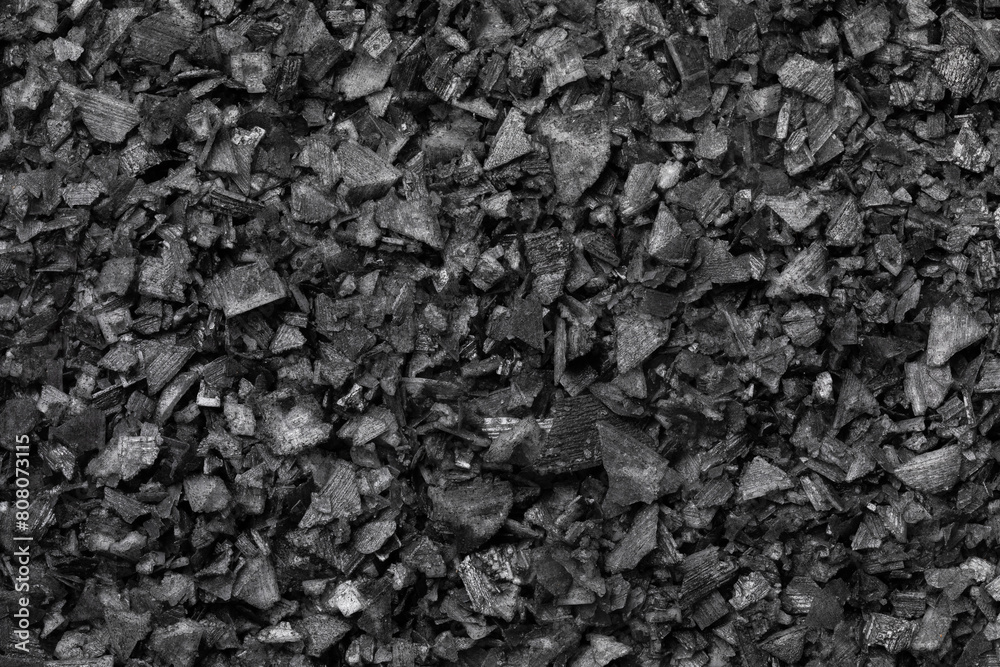 Black salt flakes close up full frame as background Black salt flakes close up full frame as background