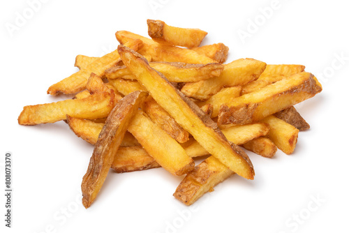 Heap of fresh baked French peel potato fries isolated on white background close up
