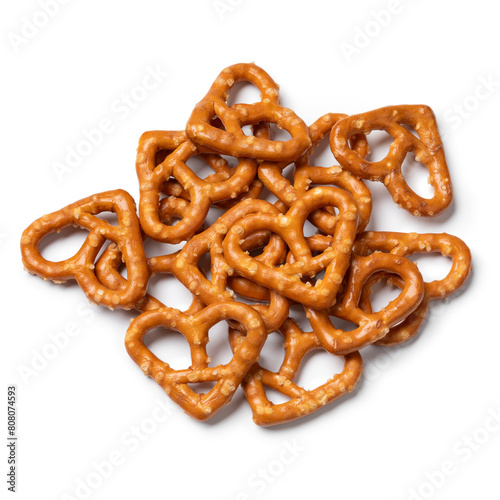 Heap of heart shaped pretzels isolated on white background close up