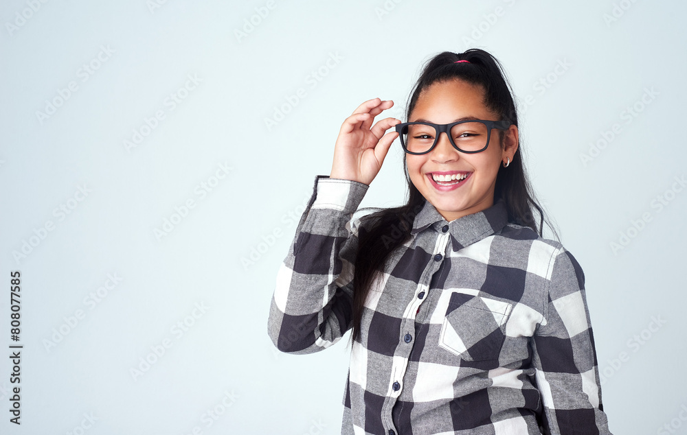 Eye care, studio and portrait of child with glasses for optometry, wellness and healthy eyesight. Mockup, girl and prescription spectacles of kid with smile, pride and confidence on white background Eye care, studio and portrait of child with glasses for optometry, wellness and healthy eyesight. Mockup, girl and prescription spectacles of kid with smile, pride and confidence on white background