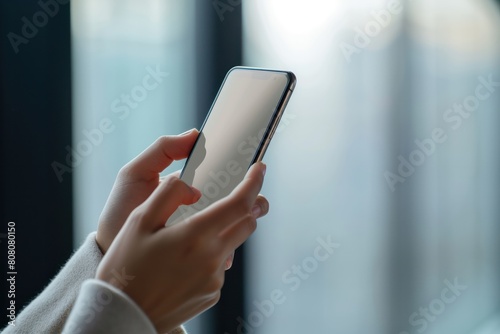 Close-up of woman s hands holding a phone.