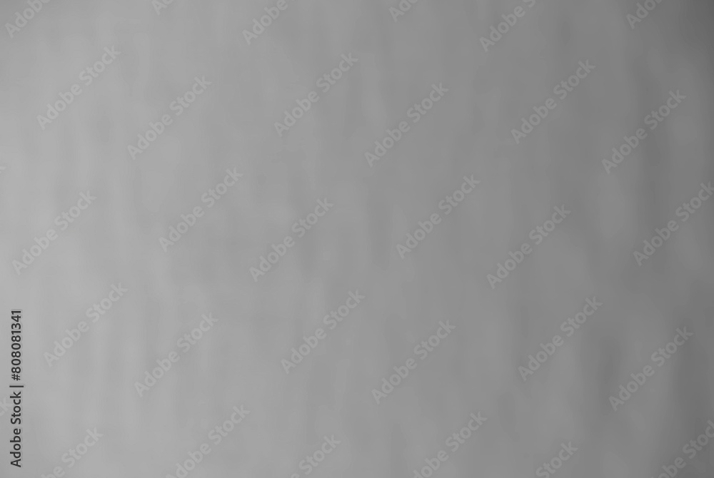 Blurred background in the form of a gray inhomogeneous surface Blurred background in the form of a gray inhomogeneous surface