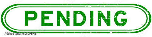 Grunge green pending word rubber seal stamp on white background