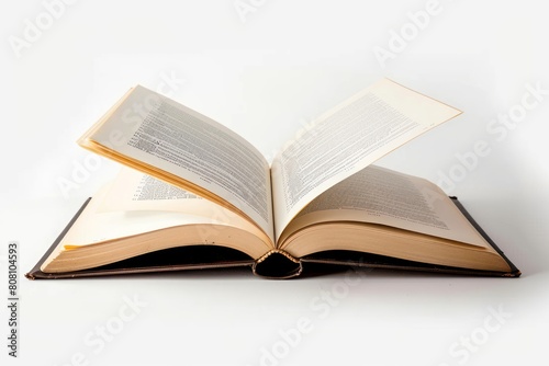 Classic hardcover book opened with pages curved against white backdrop © Tasnim