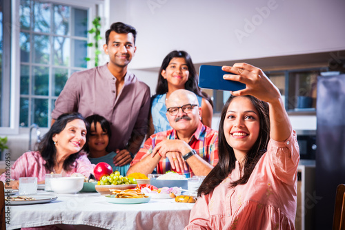 Photography Indian asian multigenerational family posing for selfie picture after having lun
