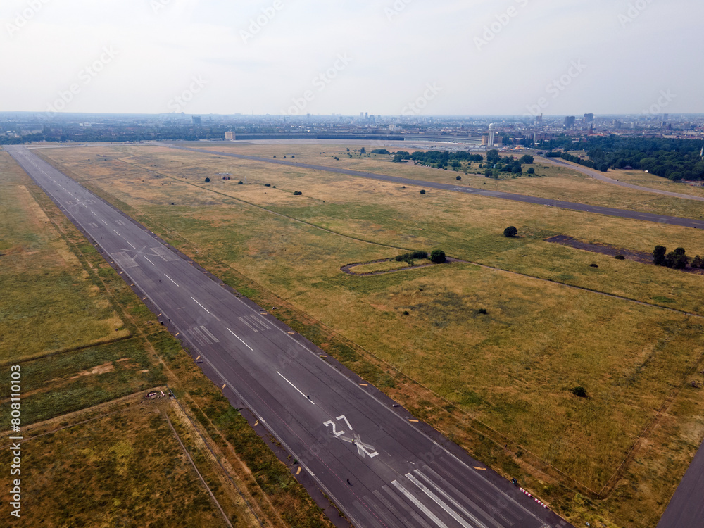 Aerial landscape of Tempelhofer Feld runway at abandoned airport in summer in Central Berlin