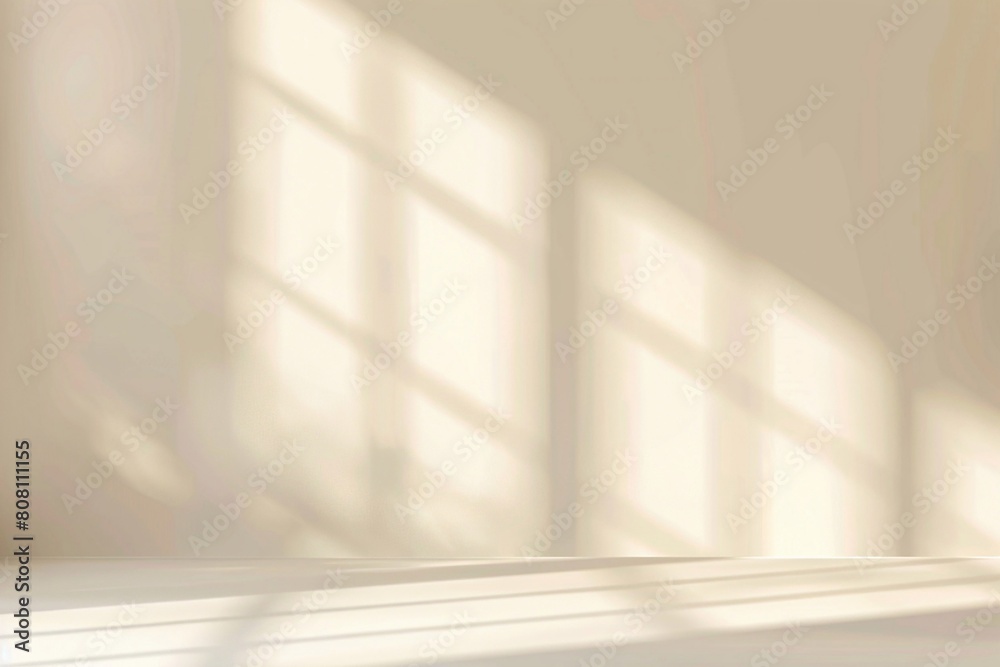 Obraz premium Abstract light beige wall, intricate interplays of light and shadow from the window.