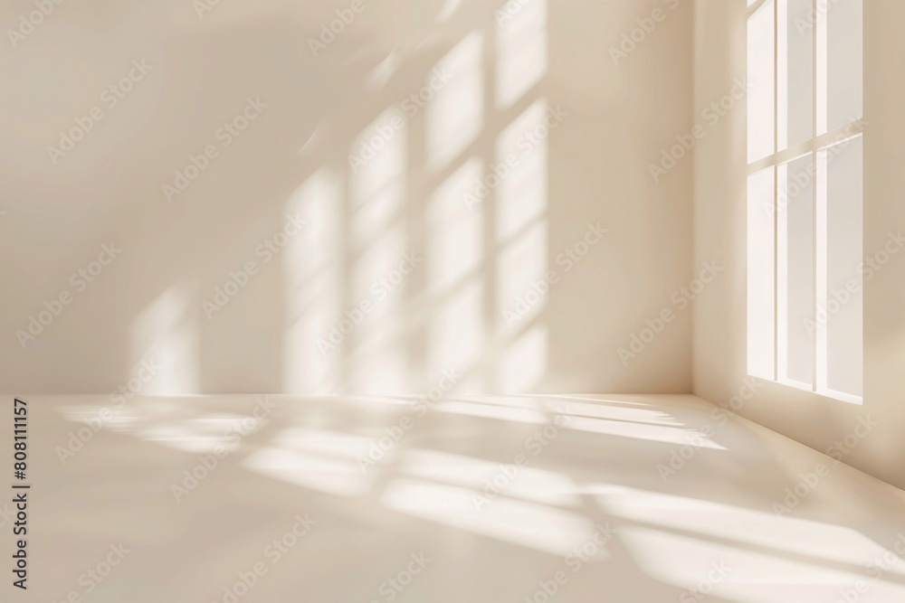 Obraz premium Abstract light beige wall, intricate interplays of light and shadow from the window.