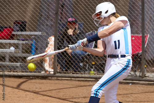 Young Female fastpitch softball player playing club sports.