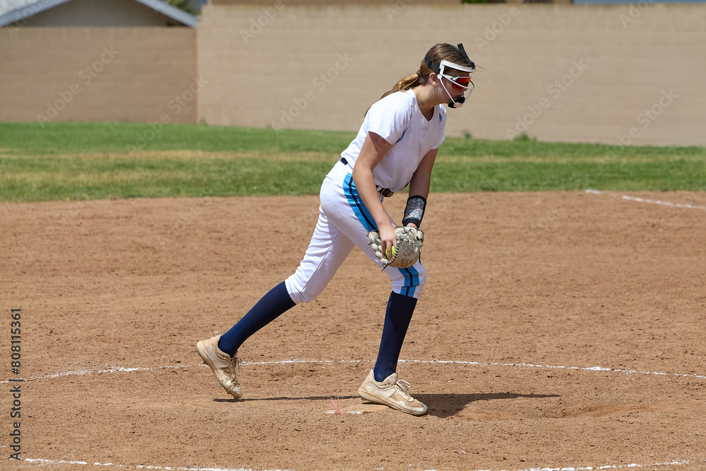 Young Female fastpitch softball player playing club sports.