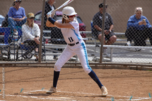 Young Female fastpitch softball player playing club sports.