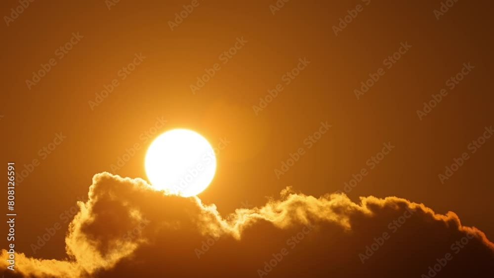 Time lapse of the sun rising through the clouds at dawn in Key West Florida