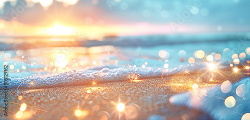 Twinkling lights on a sandy shore at sunset under a light blue sky. photo