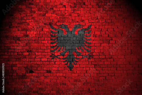 albanian flag on brick wall