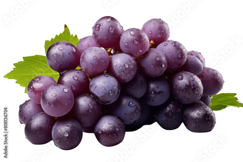 A close-up image of a bunch of ripe purple grapes with water droplets on the surface