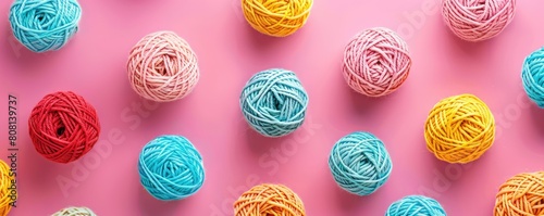 A pattern of the colorfull a balls of yarn wool, pastel color.