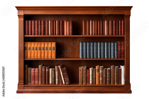 A wooden bookshelf filled with various old books. photo