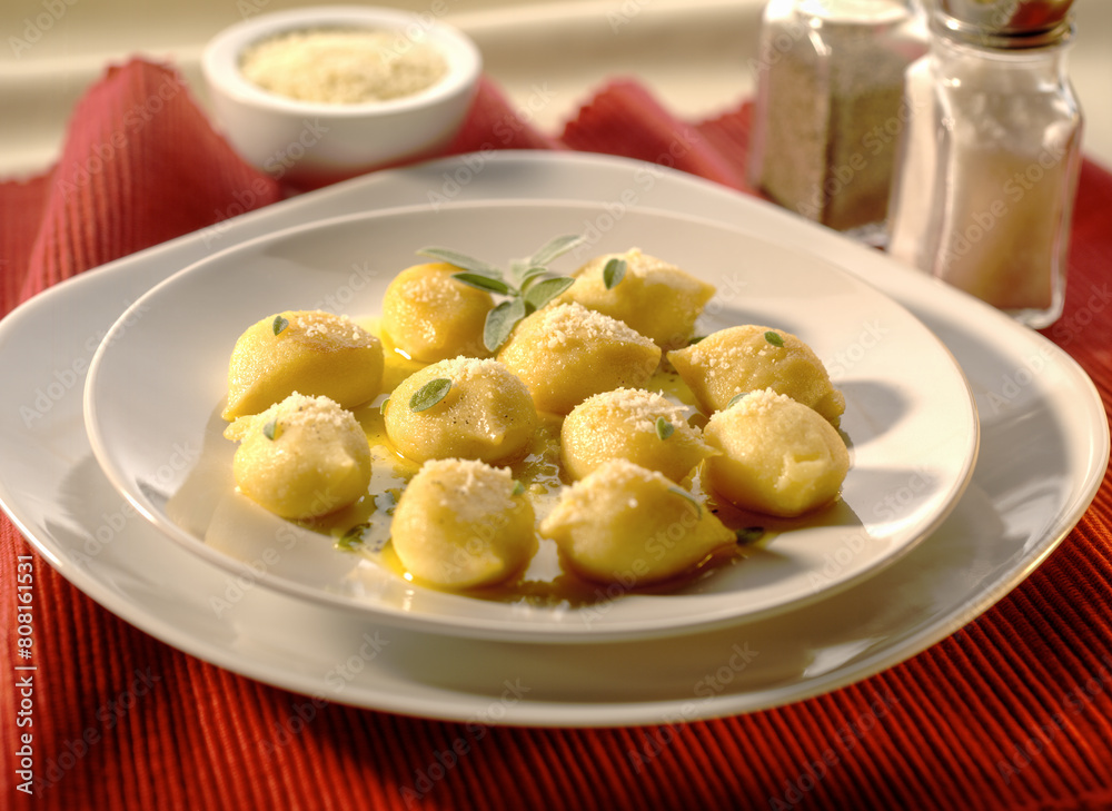 Cheese gnocchi with a sauce of fine herbs and mozzarella Cheese gnocchi with a sauce of fine herbs and mozzarella