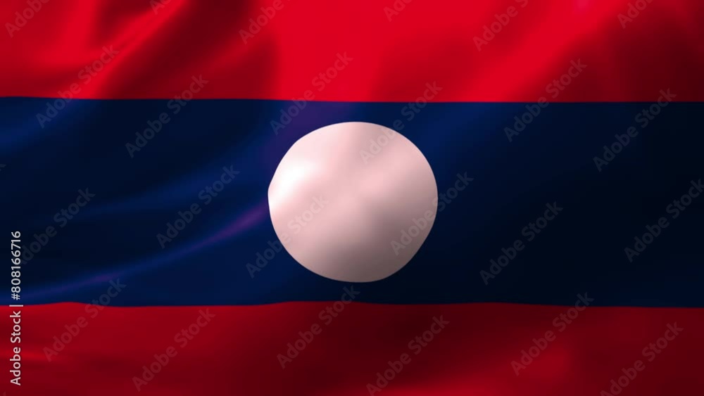 Realistic HD flag of the Laos waving in the wind. Close up of Laos Flag Slow Waving with visible. flag background texture with vibrant colors and fabric background Realistic HD flag of the Laos waving in the wind. Close up of Laos Flag Slow Waving with visible. flag background texture with vibrant colors and fabric background