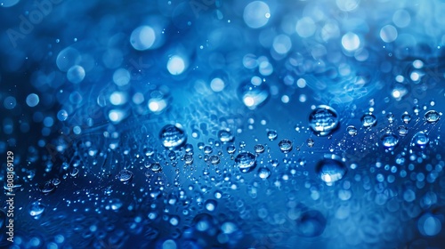 water drop close up / blue color / abstract background