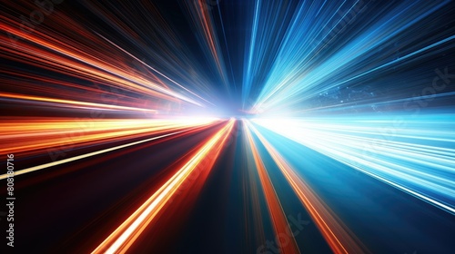 A blurred highway at night, with streaks of light from passing cars creating dynamic lines