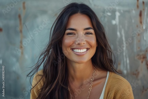 smiling woman with long hair wearing necklace joyful portrait lifestyle photography photo