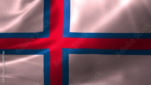 Realistic HD flag of the Faeroe Islands waving in the wind. Close up of Faeroe Islands Flag Slow Waving with visible. flag background texture with vibrant colors and fabric background photo