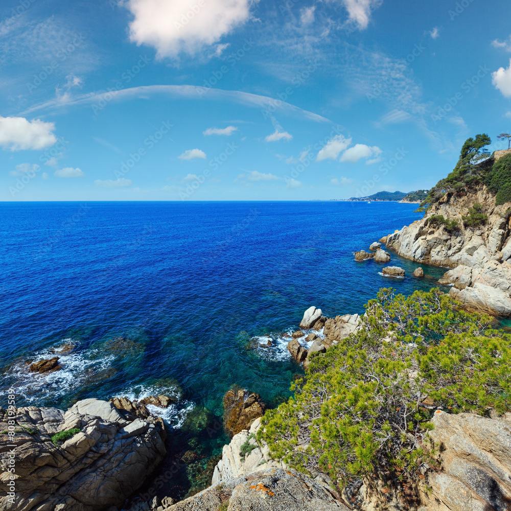 Summer sea rocky coast view with conifer trees (Catalonia, Spain). Summer sea rocky coast view with conifer trees (Catalonia, Spain).