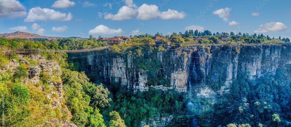 Fototapeta premium Landscape mountains in Graskop Gorge, Mpumalanga province located east of South Africa, recreation area with a gorge, plus zip lining & a suspension bridge.