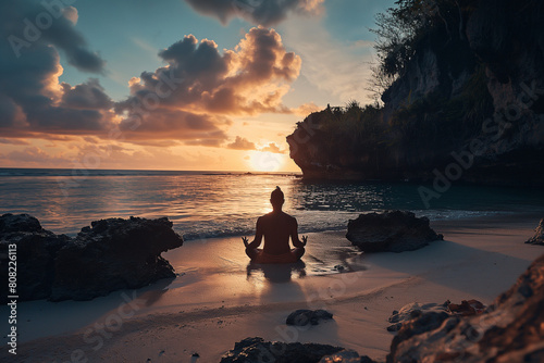 solo traveler meditating on secluded beach photo