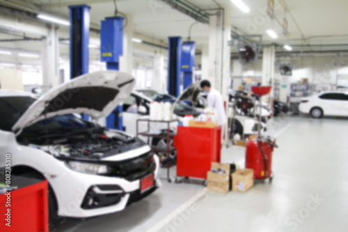 Blurry Line of body Car with the equipment repair station in the garage shop. fix maintenance or checking by mechanic workshop. Business about of car or vehicle concept.