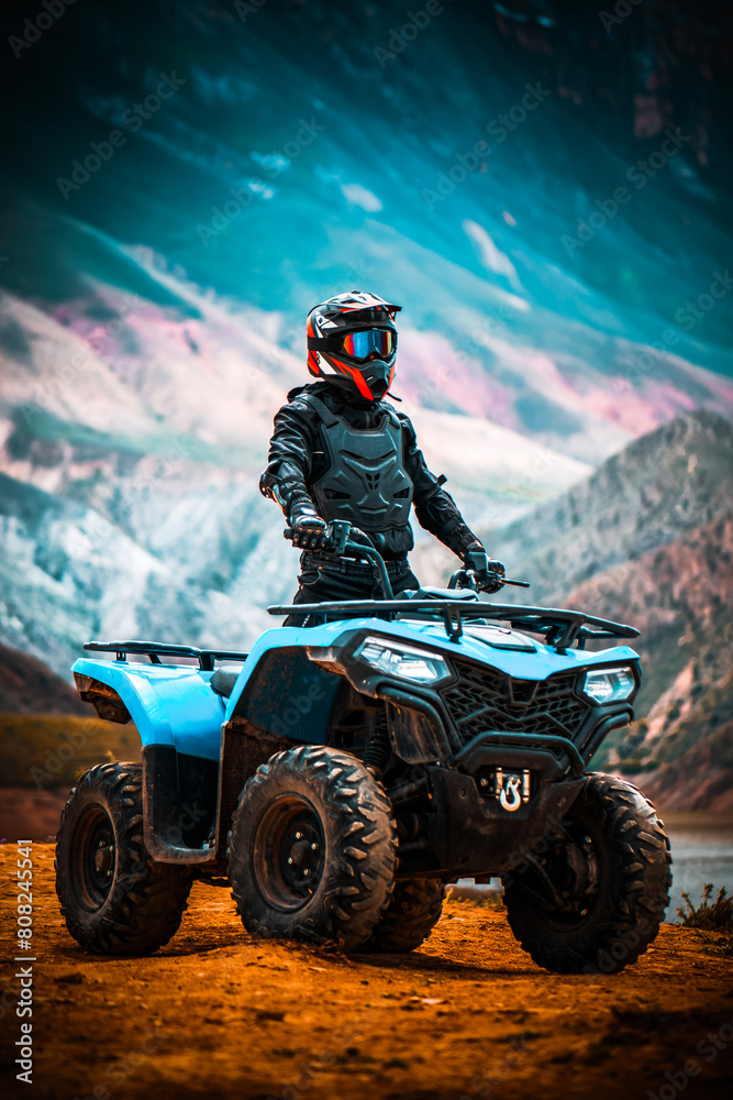 atv 4x4 driver wearing helmet in the mountains