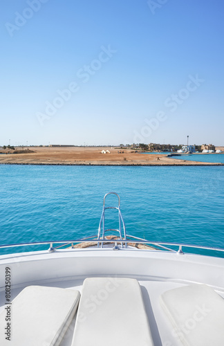 Sun beds on a boat deck, selective focus.