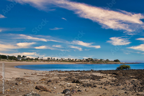 The beach at the low-key tourist resort of Point Samson  on the remote Pilbara coast of Western Australia. Crescent tropical beach. 