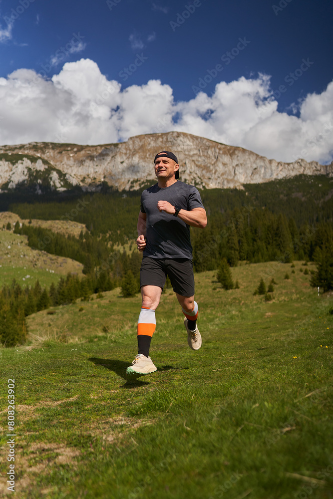 Trail runner man in a race Trail runner man in a race