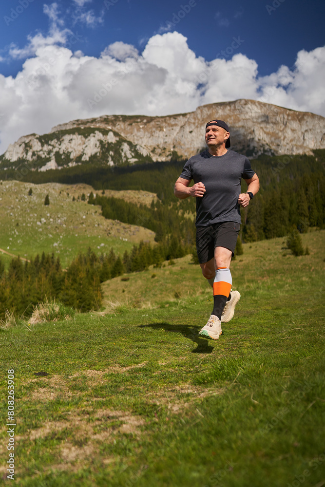 Trail runner man in a race Trail runner man in a race