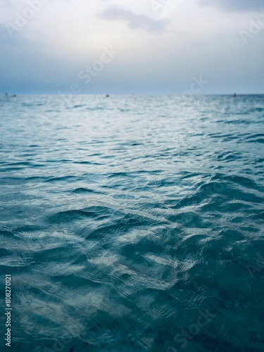 cloudy seascape, sea horizon, azure sea surface