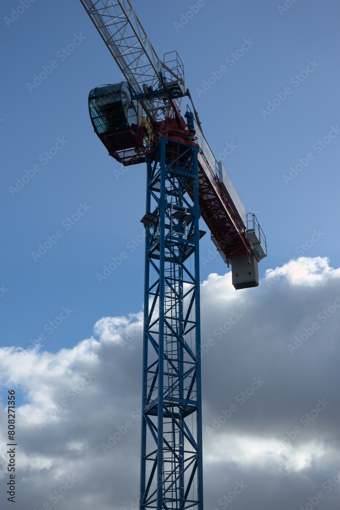 Construction crane in action, building and civil engineering Construction crane in action, building and civil engineering