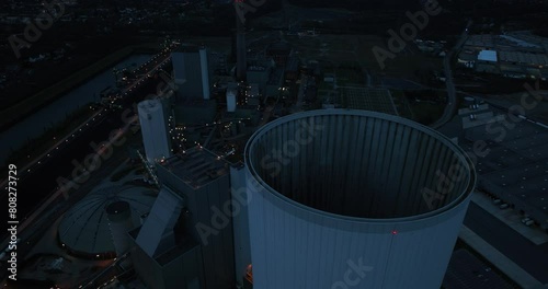 Detail views at night at the Duisburg Walsum coal fired power station. Productin electricity, steam and heat for district heating. Aerial birds eye drone views. photo