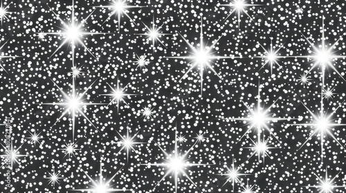   A black and white photograph of stars and snowflakes against a dark background  featuring contrasting white stars and snowflakes
